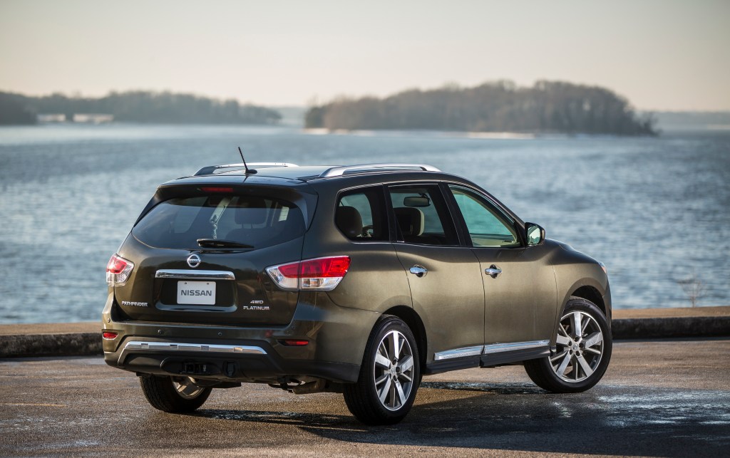 The 2016 Nissan Pathfinder, parked and looking out toward the water.