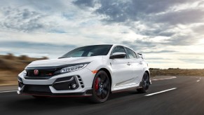 A white 2020 Honda Civic Type R drives down the road