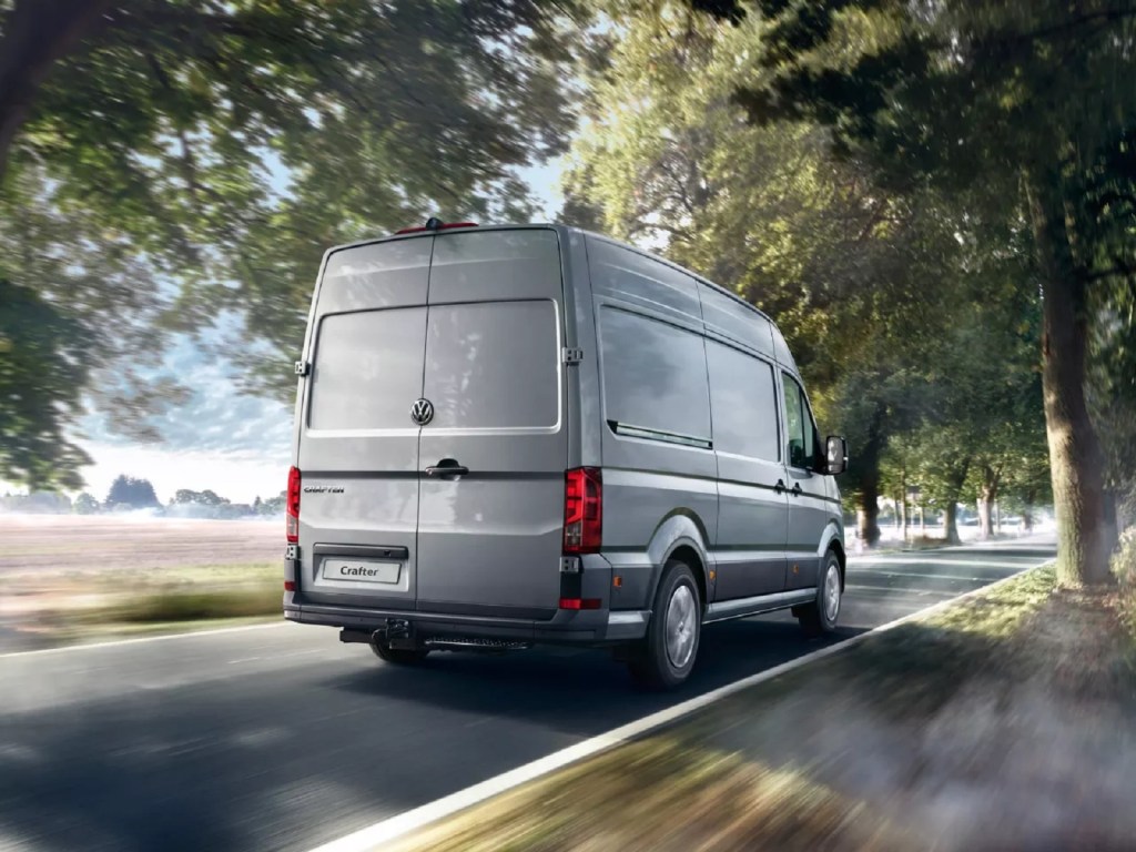A gray 2020 Volkswagen Crafter drives down the road