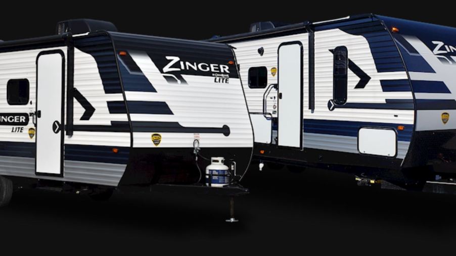 Two Zinger RV travel trailers side-by-side