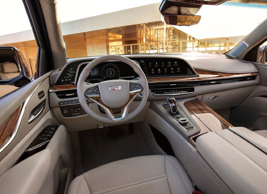 The dashboard and tan-leather front seats of the 2021 Cadillac Escalade