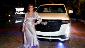 Michelle Pesce poses with the all-new 2021 Cadillac Escalade during the Cadillac Oscar Week Celebration