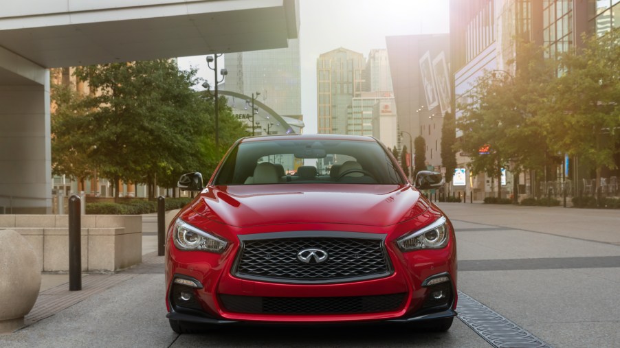 The 2021 Infiniti Q50 facing the camera in the middle of a city