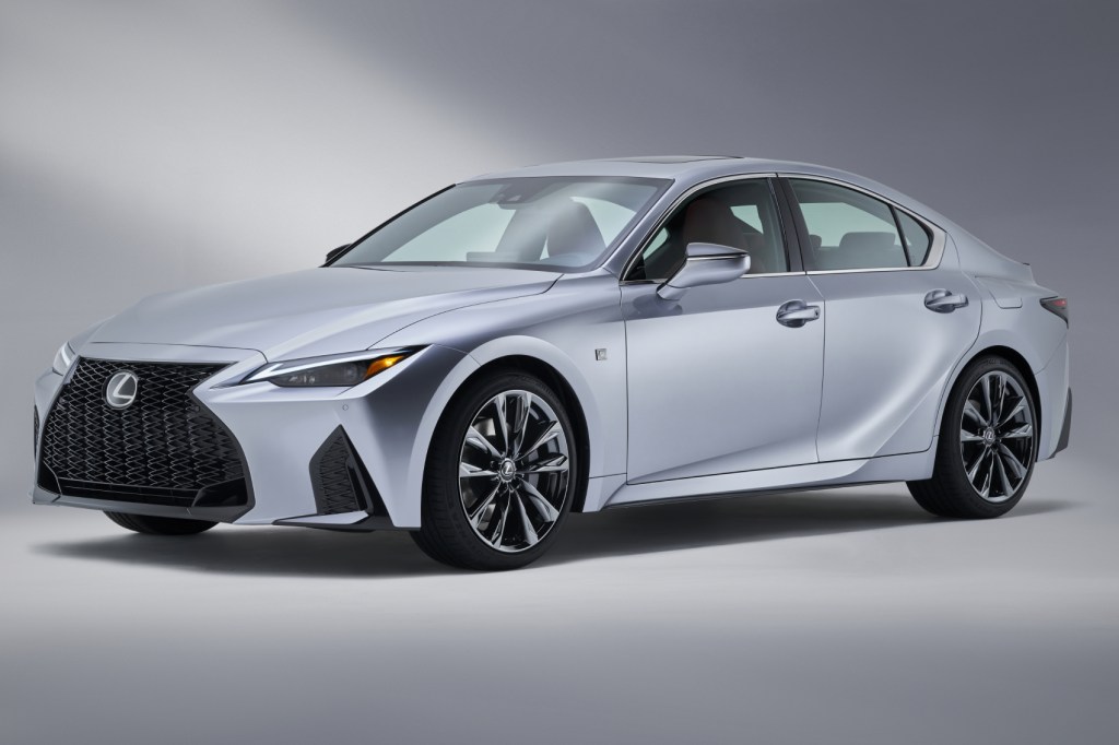 The 2021 Lexus IS 350 F Sport on display in front of a gray background