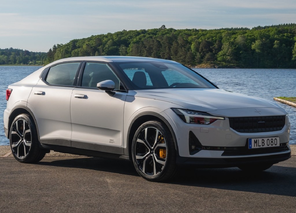A white 2021 Polestar 2 in front of a body of water