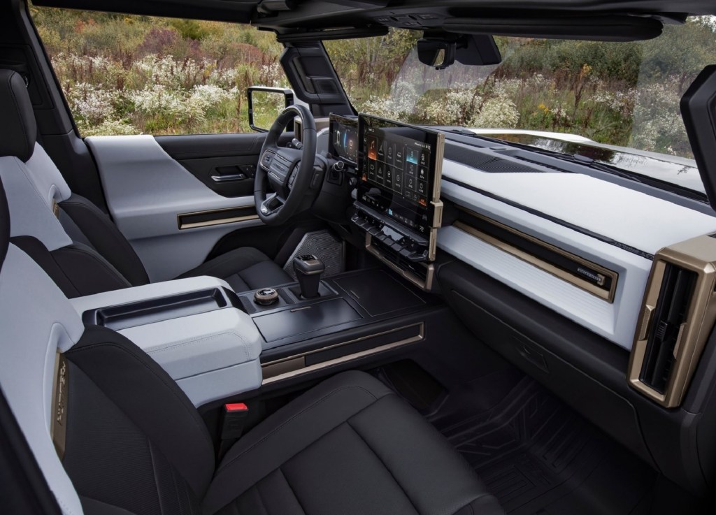The 2022 GMC Hummer EV Edition 1's front seats, dashboard, and digital screens