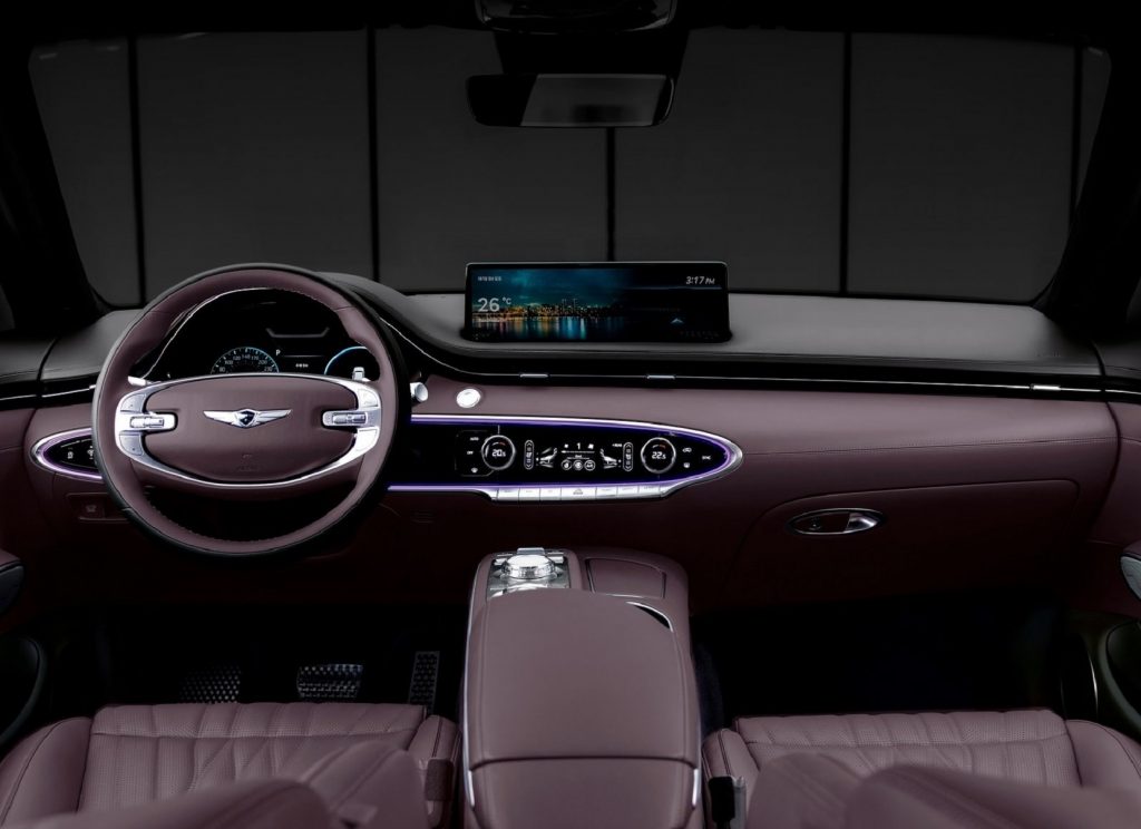 The purple front seats and dashboard of the 2022 Genesis GV70