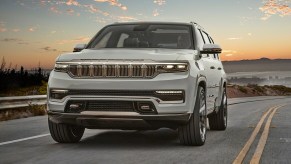 2022 Jeep Grand Wagoneer driving at dusk