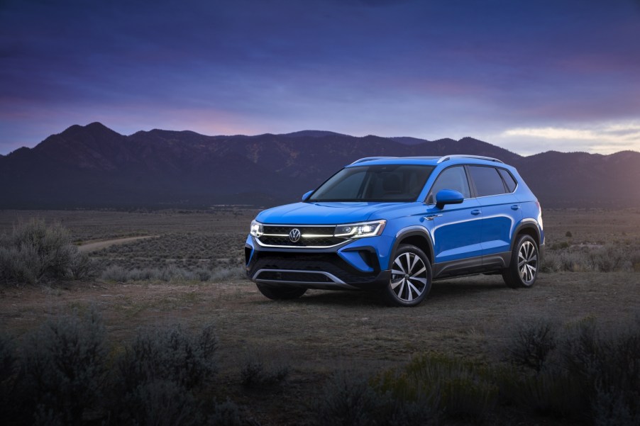 Press image of a blue 2022 Volkswagen Taos in the desert