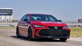 A red 2020 Toyota Avalon on a speed track