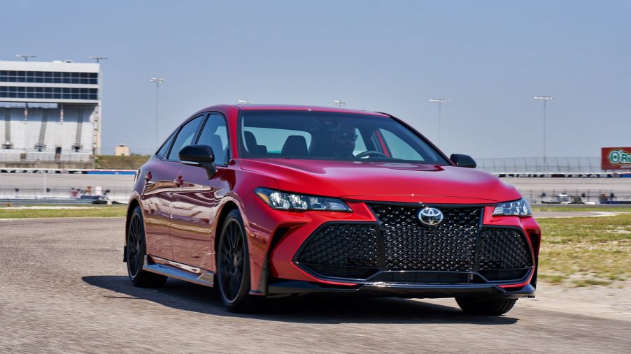 A red 2020 Toyota Avalon on a speed track