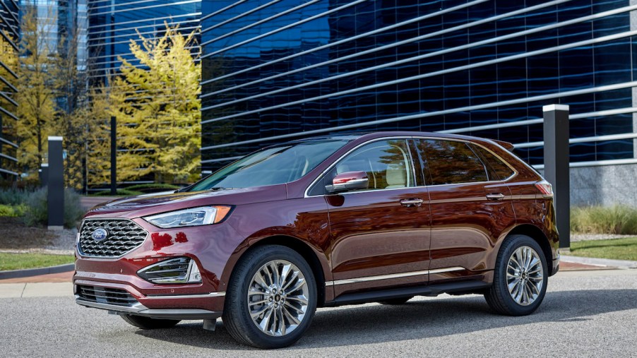 A burgundy 2021 Ford Edge outdoors.