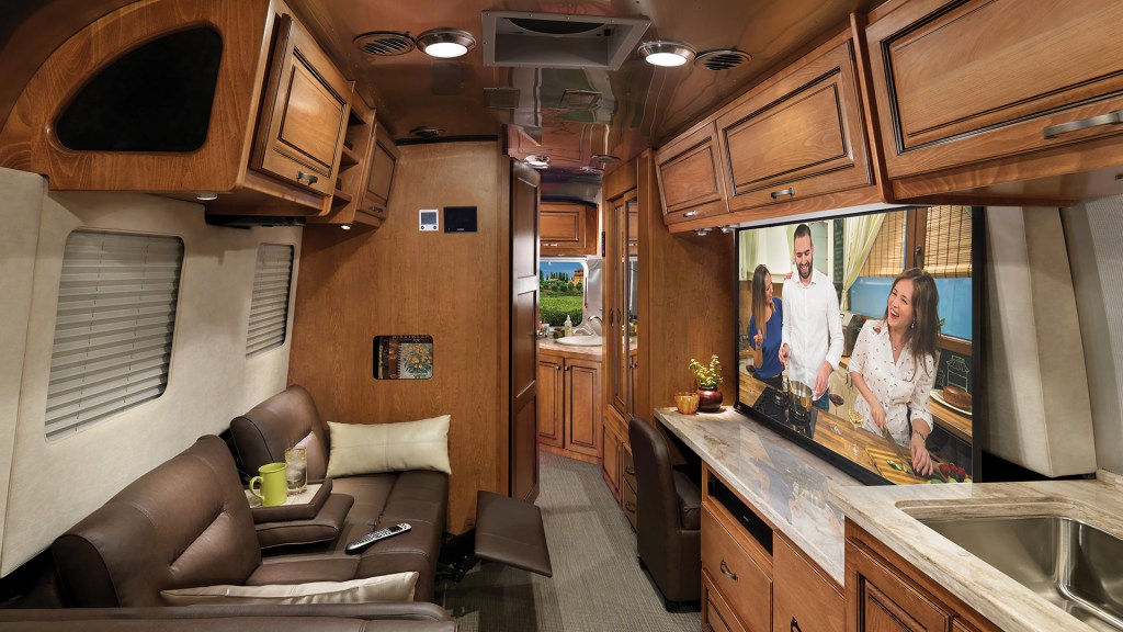 the entertainment space of an Airstream classic with a HDTV