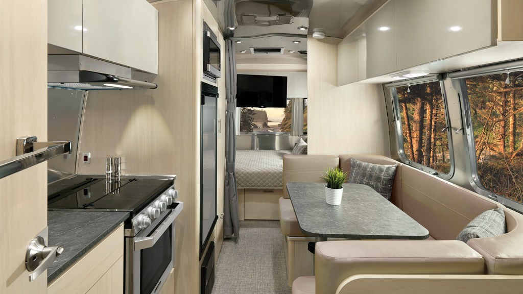 The dining area inside a Flying Cloud travel trailer.