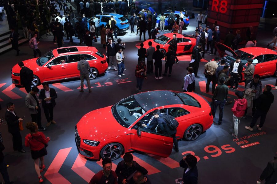 Audi cars, including the Audi RS5 (bottom) are displayed on the opening day of the Shanghai Auto Show