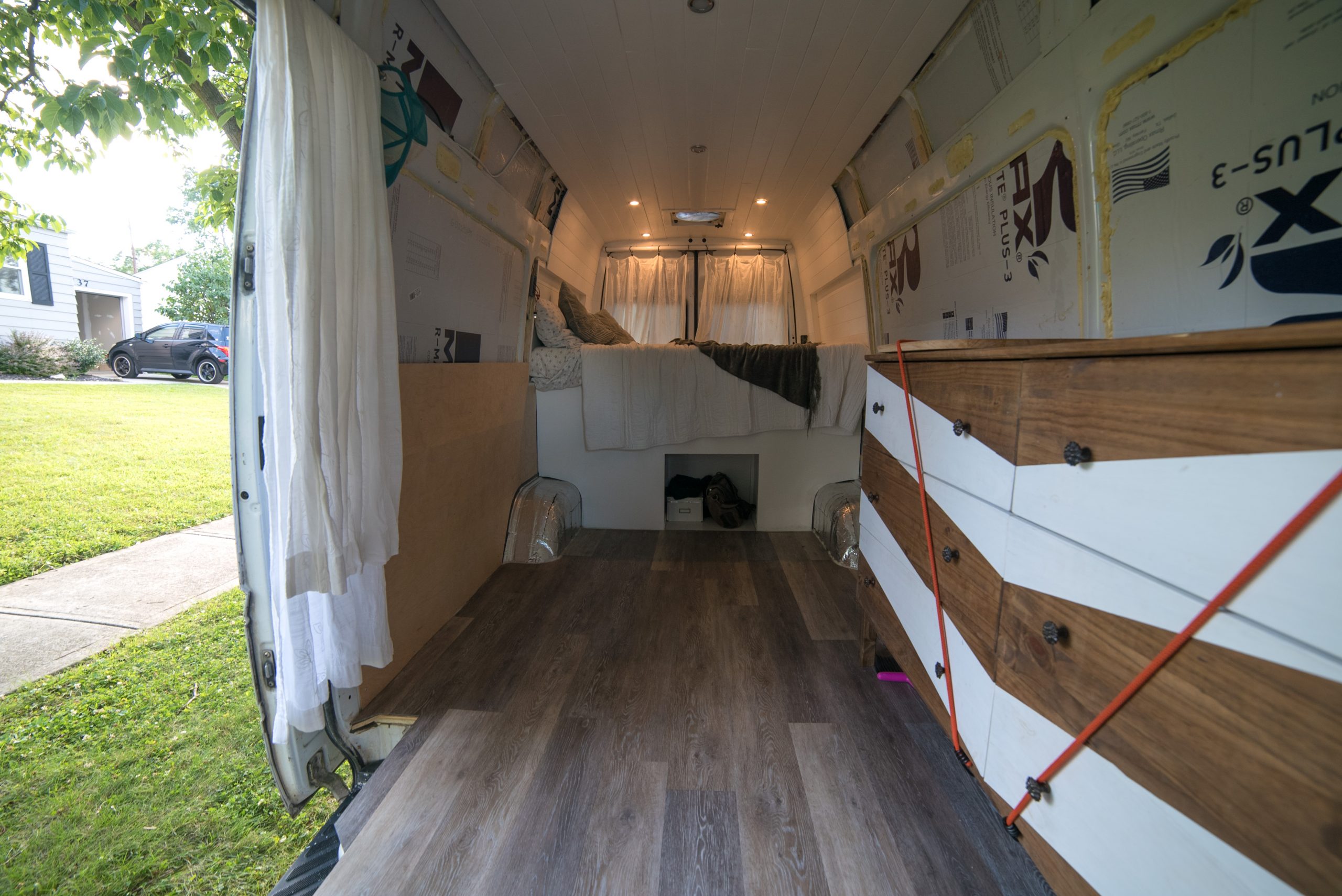 The layout inside of a converted camper van