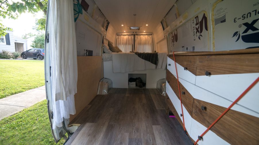 The layout inside of a converted camper van
