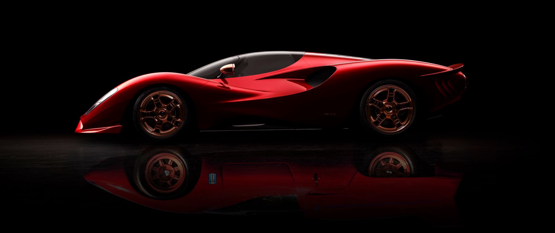 A red, low-slung, curvy sports car sits against a black background. The De Tomaso P72