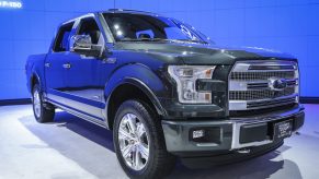 A Ford F-Series truck on display at an auto show