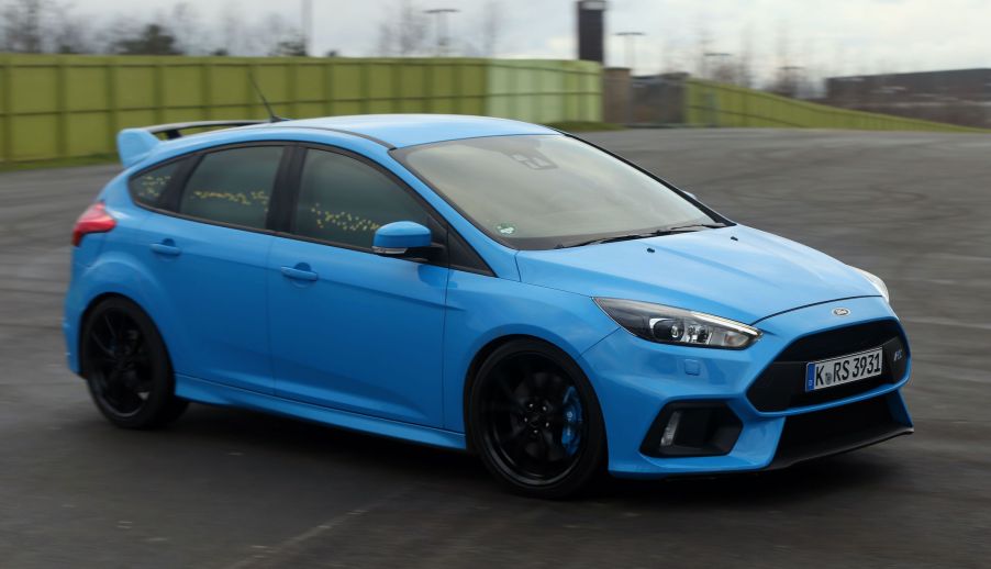 A Ford Focus RS, at Stratford Waterfront in London, displays its 'Buzz Moment' whereby some exterior lights illuminate in tune to the driver's emotions