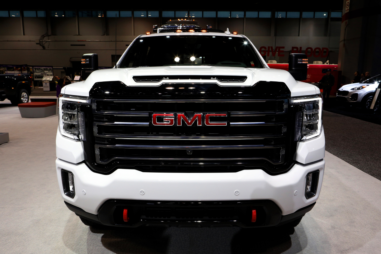 A GMC Sierra truck on display at an auto show