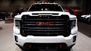 A GMC Sierra truck on display at an auto show