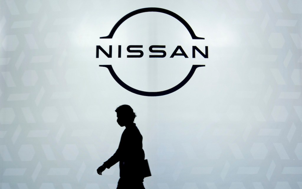 A close up image of the Nissan logo.