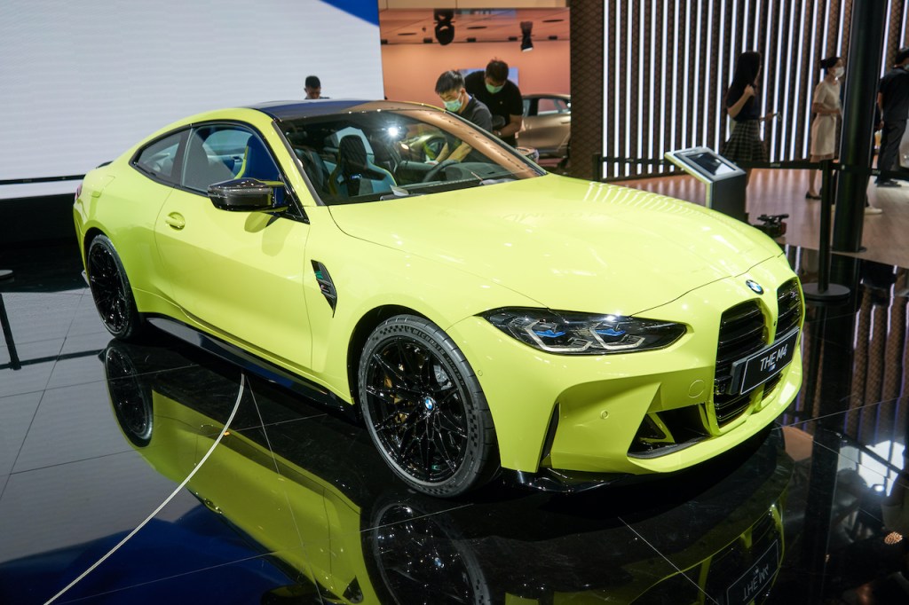 A photo of the BMW M4 at an auto show.