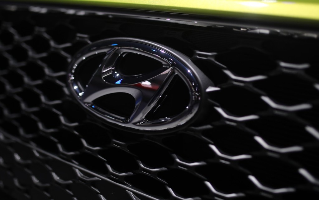 A close up image of the Hyundai logo.