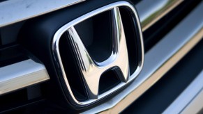 A Honda logo seen on the front of a car