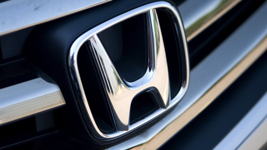 A Honda logo seen on the front of a car