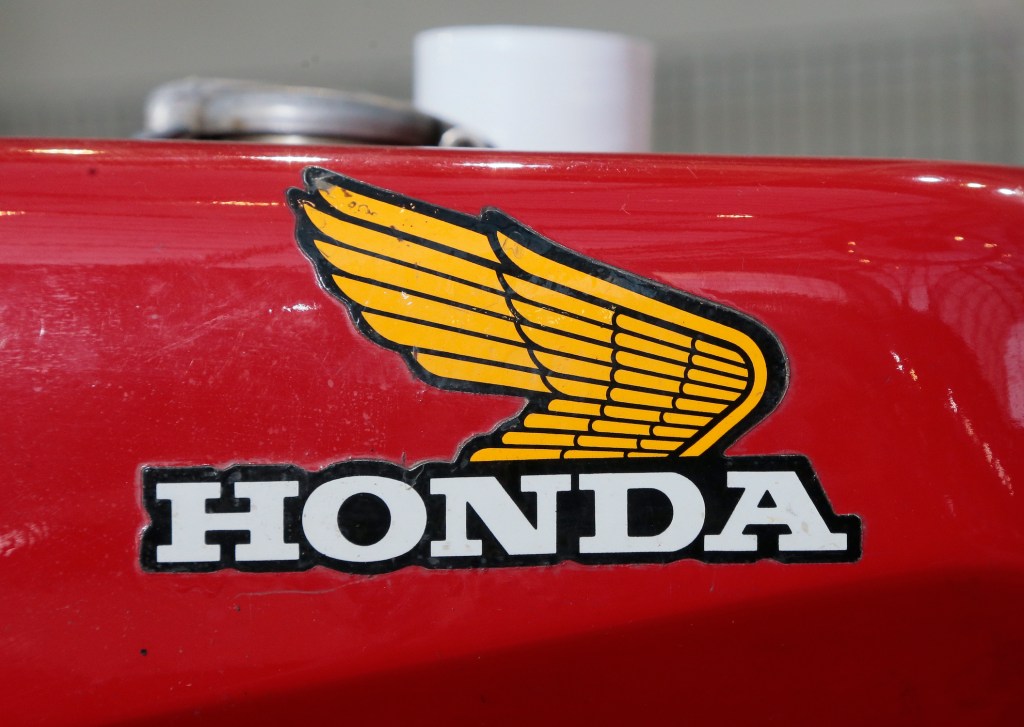 he brand on the reservoir of a 1960's Honda motorcycle