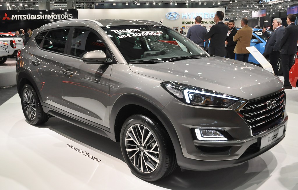 A Hyundai Tucson compact SUV on display at an auto show