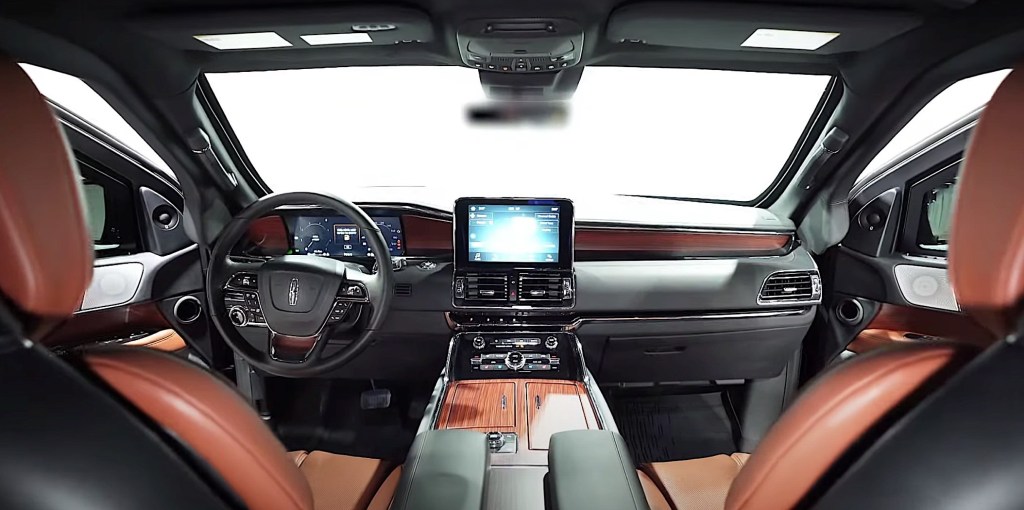 The two-tone brown/black interior of an armored 2020 Lincoln Navigator L