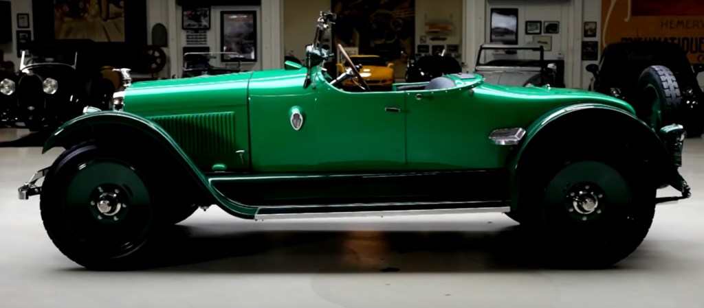 The side view of Jay Leno's restored green 1922 Wills Sainte Claire roadster