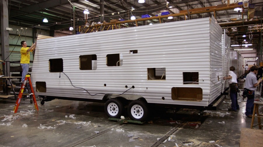 Workers at Jayco, Inc., the country's third largest maker of recreational vehicles, construct Jay Flight travel trailers