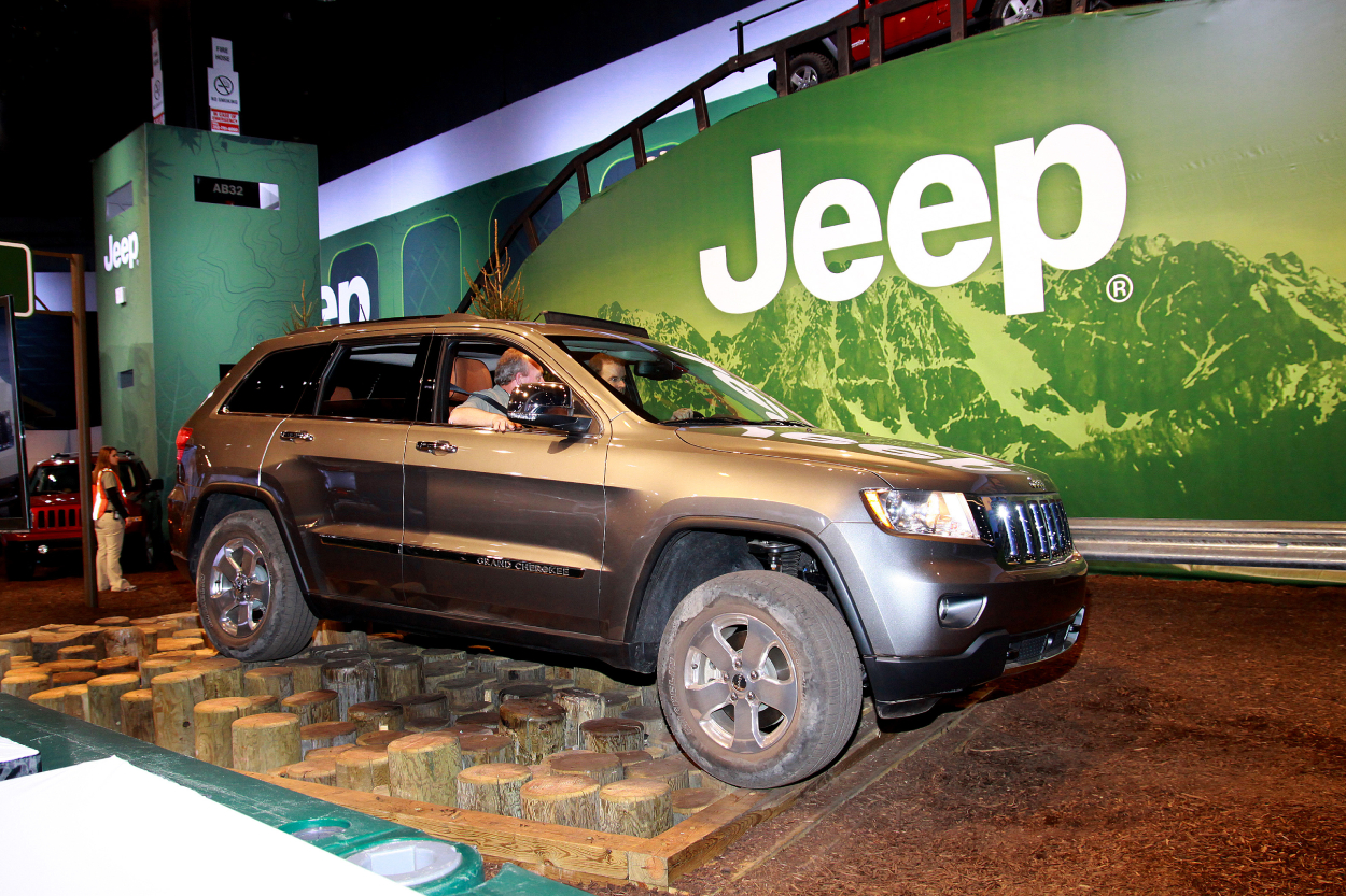 A Jeep Grand Cherokee on display at an auto show