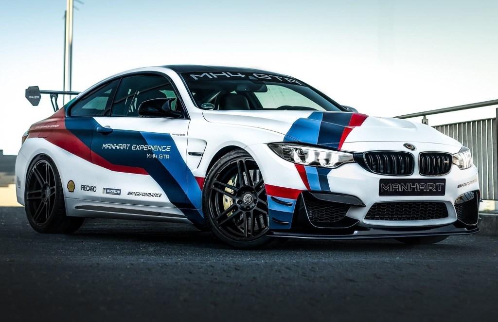 A white with red-and-blue-stripes Manhart MH4 GTR