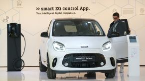 FRANKFURT AM MAIN, GERMANY - SEPTEMBER 09: A visitor look at the Smart EQ forfour Edition 1 electric car at the Mercedes-Benz media preview at the 2019 IAA Frankfurt Auto Show on September 09, 2019 in Frankfurt am Main, Germany. The IAA will be open to the public from September 12 through 22. (Photo by Sean Gallup/Getty Images)