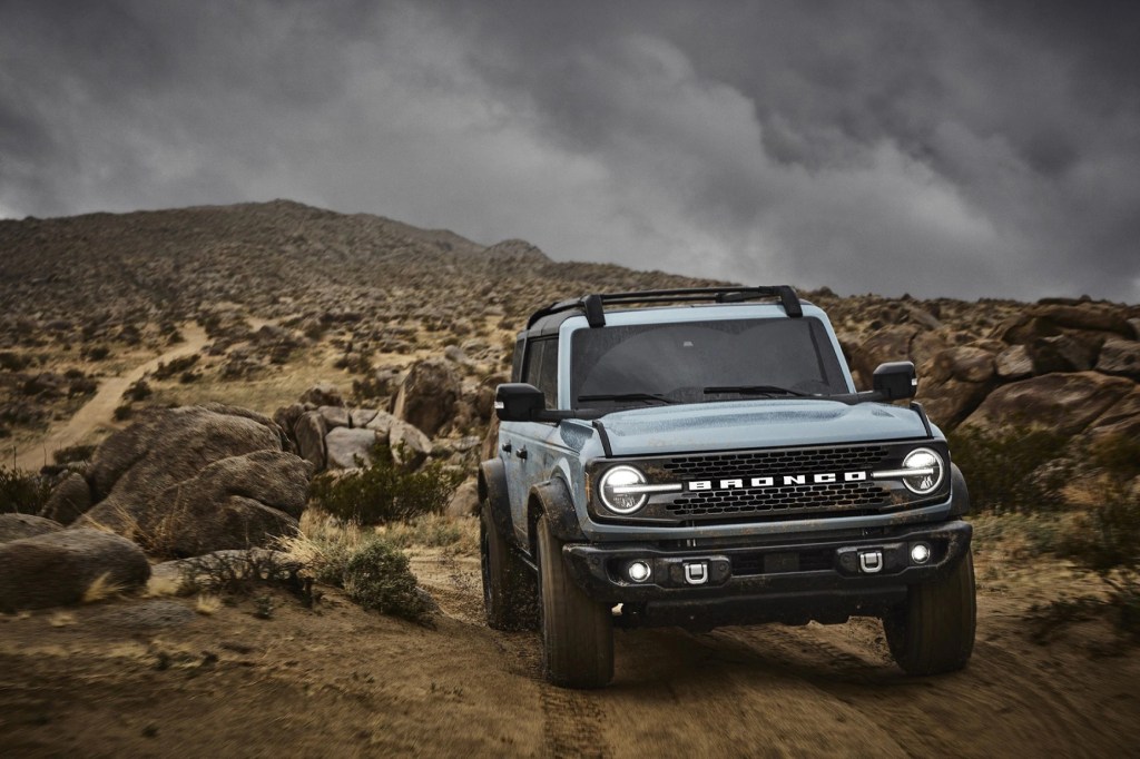 A silver 2021 Ford Bronco on display in the wilderness