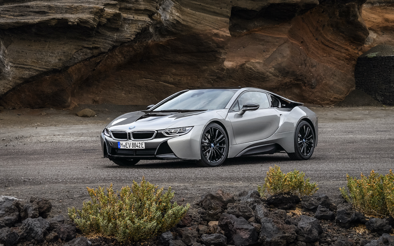 An image of a BMW i8 parked outside on display.