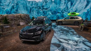 The 2020 Subaru Outback, sibling of the Subaru Legacy, is seen in a U.S. National Park-themed display at AutoMobility