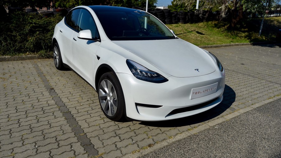 A picture taken on September 5, 2020 shows a "Tesla Model Y" car, an all-electric compact SUV by US electric car giant Tesla, during its presentation at the Automobile Club