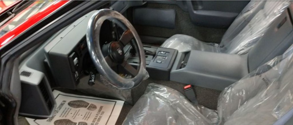 The grey interior of the last Pontiac Fiero ever produced.