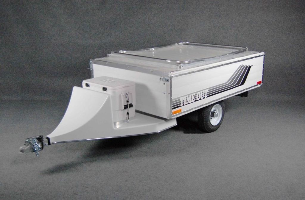 A white Time Out motorcycle camper RV trailer