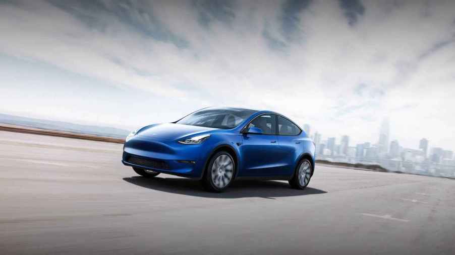 An image of a Tesla Model Y rolling down the road.