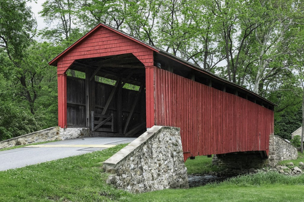 The Pool Forge Covered Bridge at Lancaster County in Pennsylvania. Perfect road trip scenery 