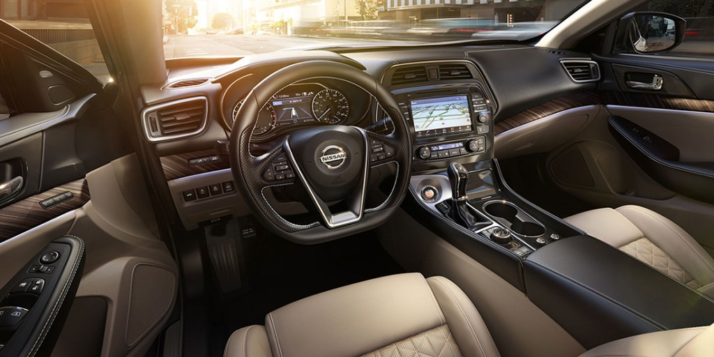 The front row seats of a 2017 Maxima .
