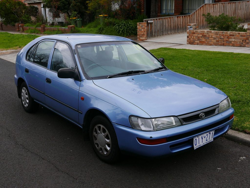 a blue 1997 Corolla hatchback