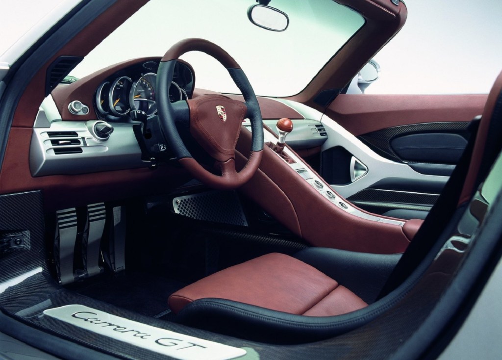 The 2004 Porsche Carrera GT's red-leather front seats and dashboard